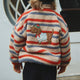 Konges Slojd laste fliis tikitud Joddy Teddy Tangerine Stripe mustriga